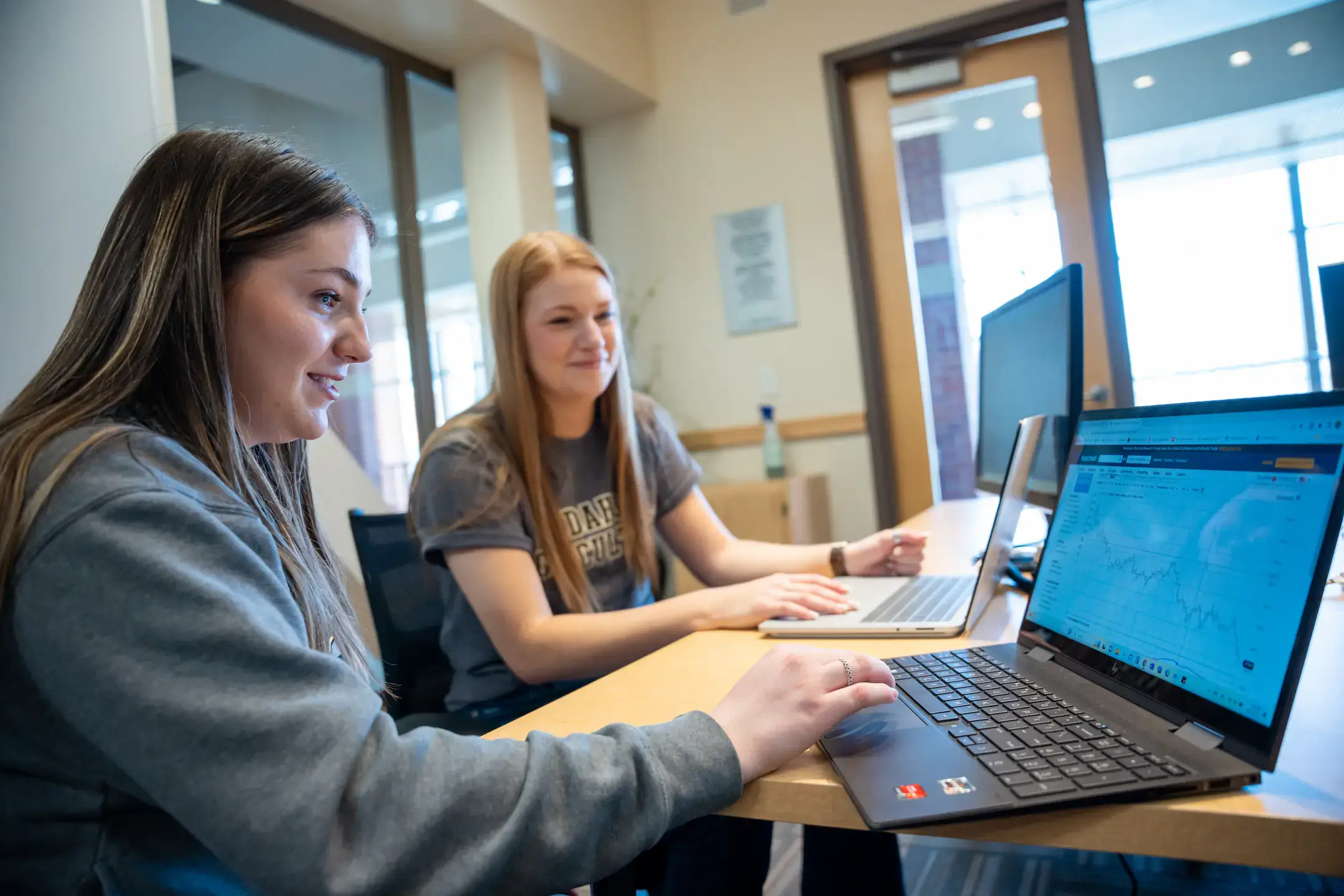 Stock photos and b-roll of AERS students in the Barker Trading Room to use for future marketing efforts.