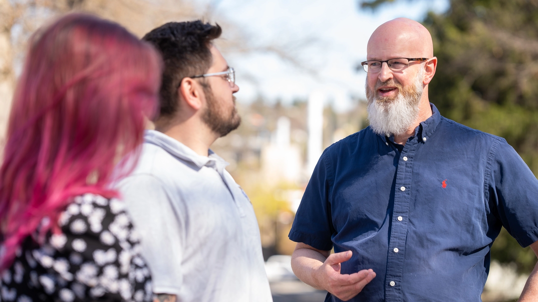 Vandal Gateway Program student Addie Clements and Jonathon Estrada are pictured with Program Coordinator Brian Dulin on the Ӱֱ campus in Moscow, ID on April 14, 2025.