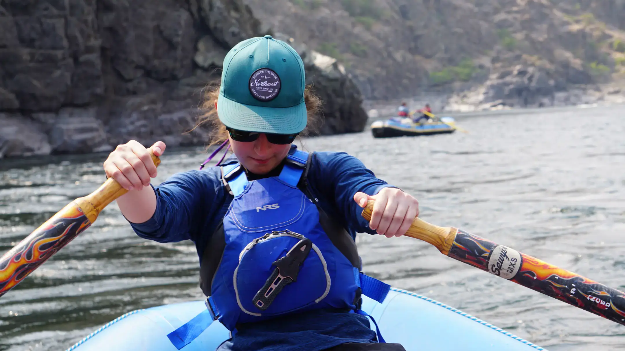 Arielle Bennet rows a raft.