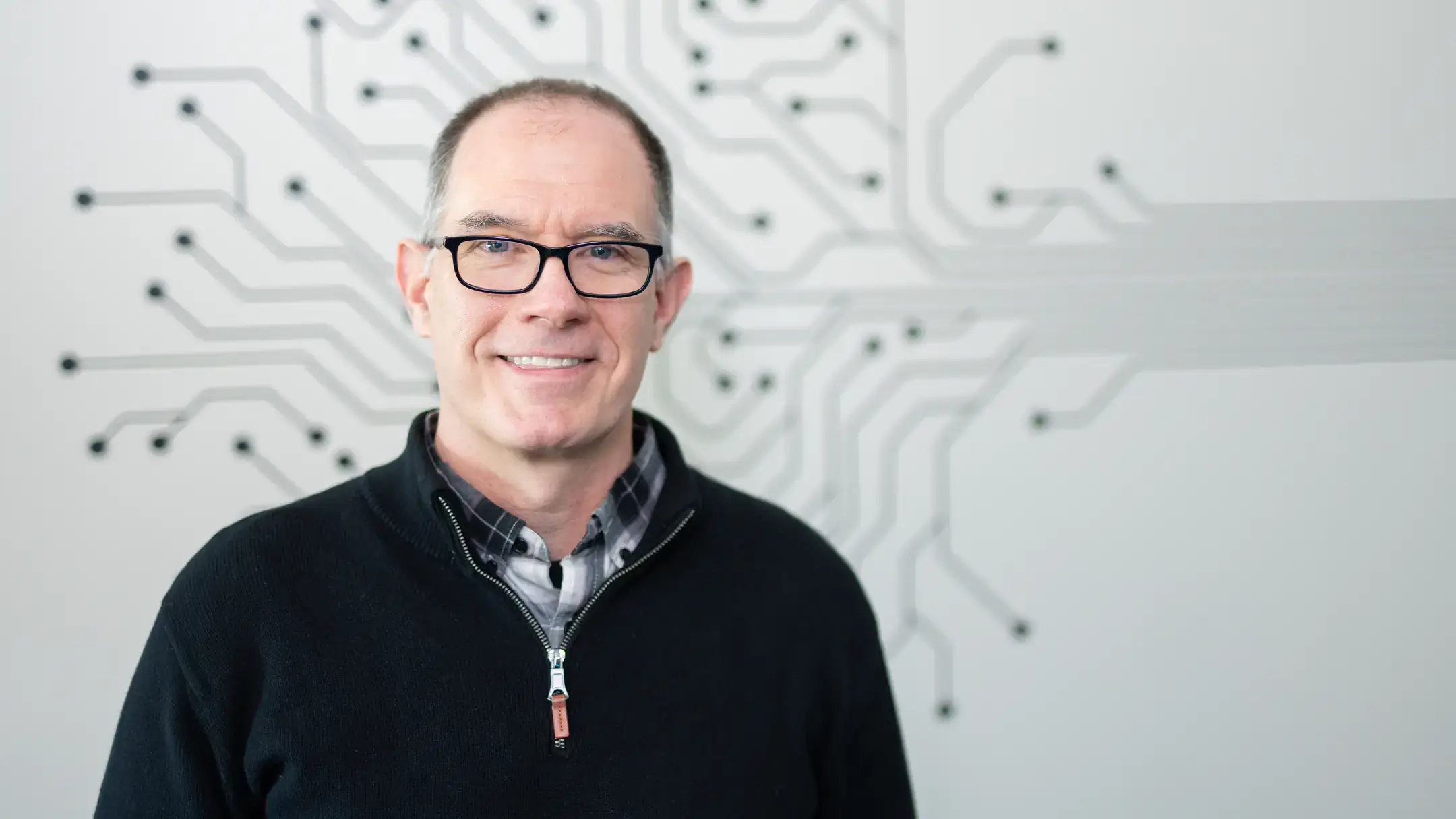 Luke Sheneman, Director of Research Computing and Data Services at the Institute for Interdisciplinary Data Sciences
