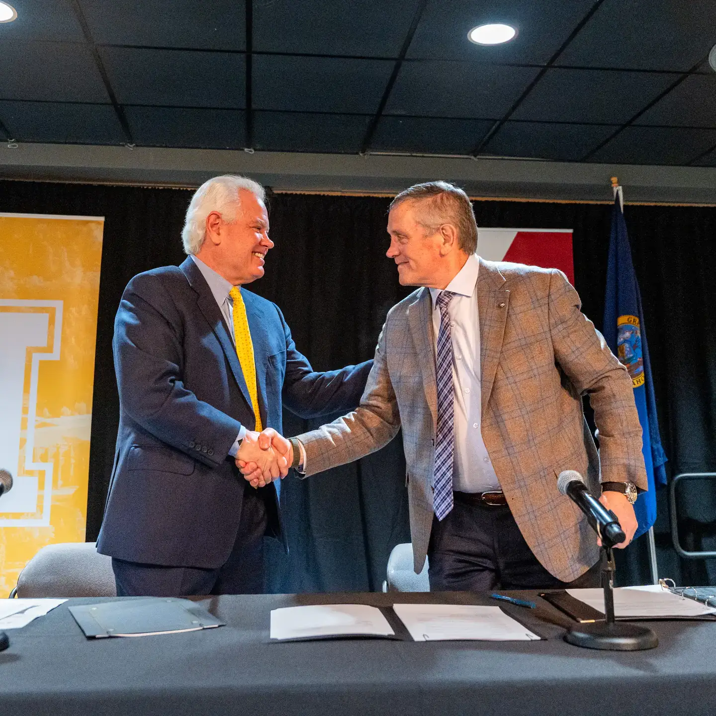 University of Idaho President Scott Green (left) and North Idaho College President Nick Swayne sign a memorandum of understanding (MOU), to collaboratively develop and deliver a new Direct Entry Master of Science in Nursing (DEMSN) program, on Wednesday, April 15, 2026 in the Vandal Ballroom at the University of Idaho’s Pitman Center.