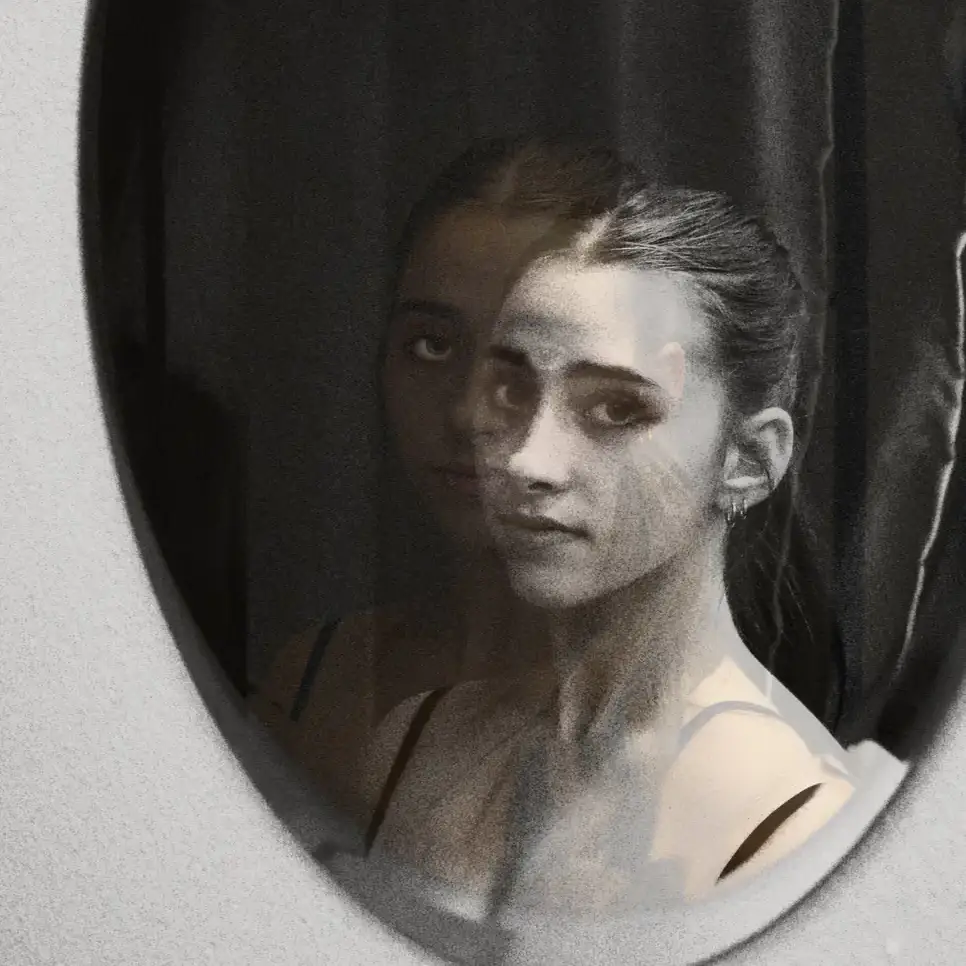 Charcoal drawing of a woman's reflection