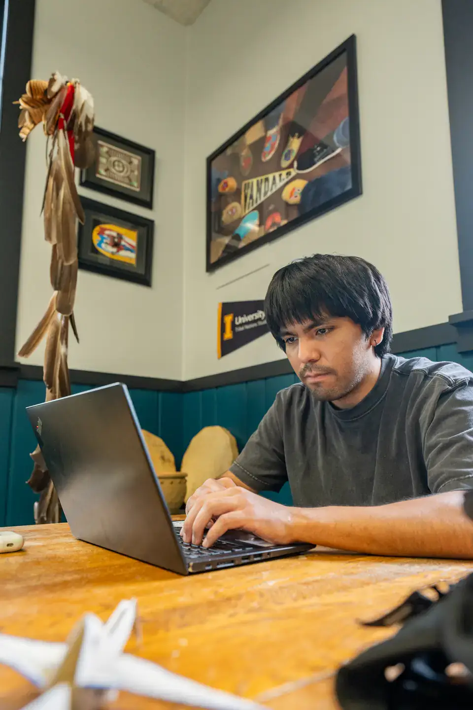 A student using his laptop.