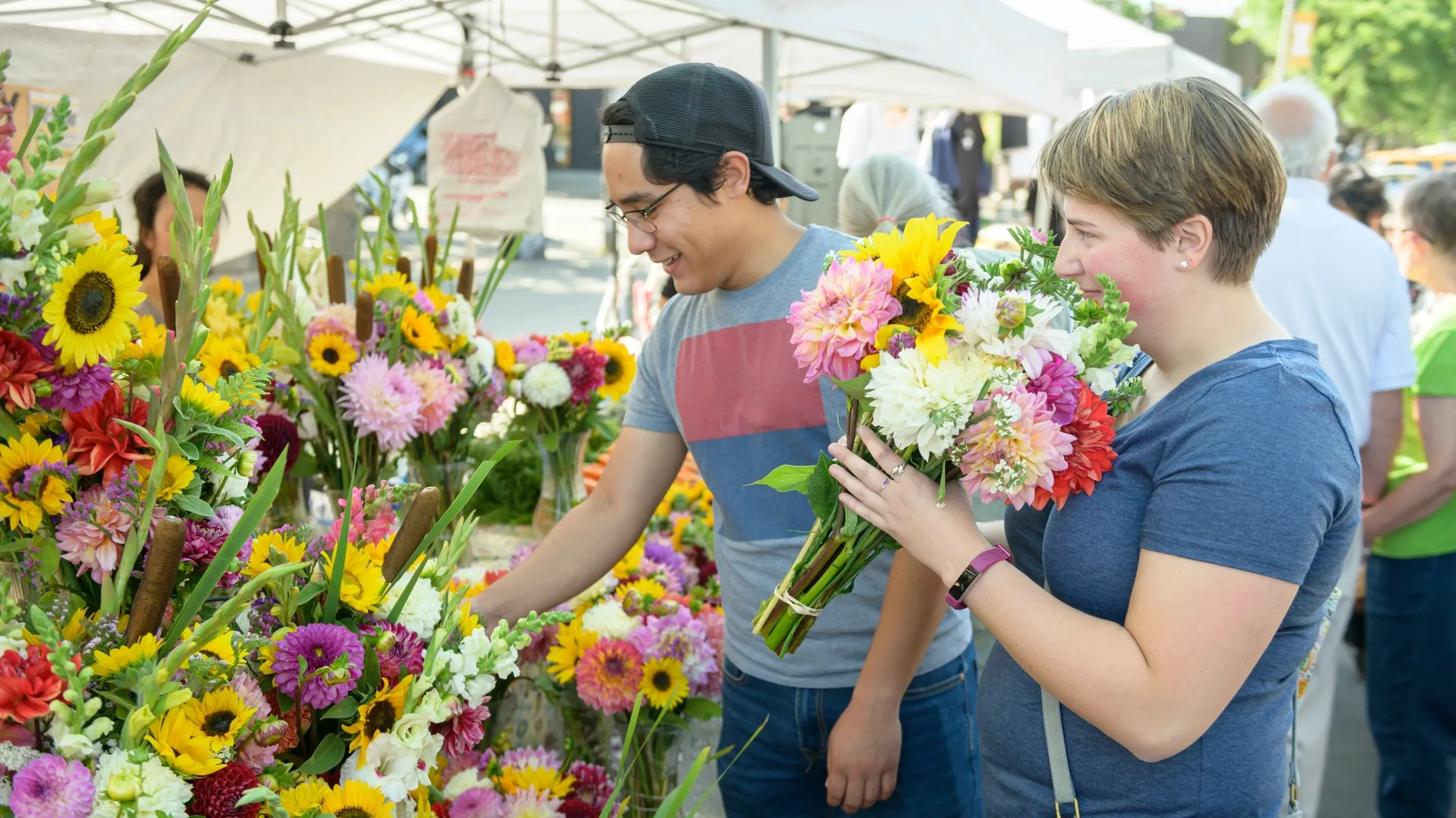 Students and community members gather on Main Street for Moscow Farmer's Market summer 2019