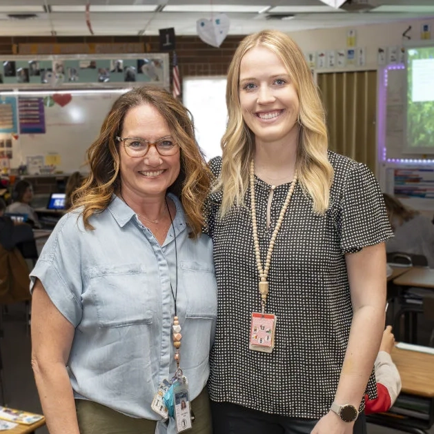 Emmerson Cox smiles next to her mentor Heidi Cornell who is Idaho teacher of the year