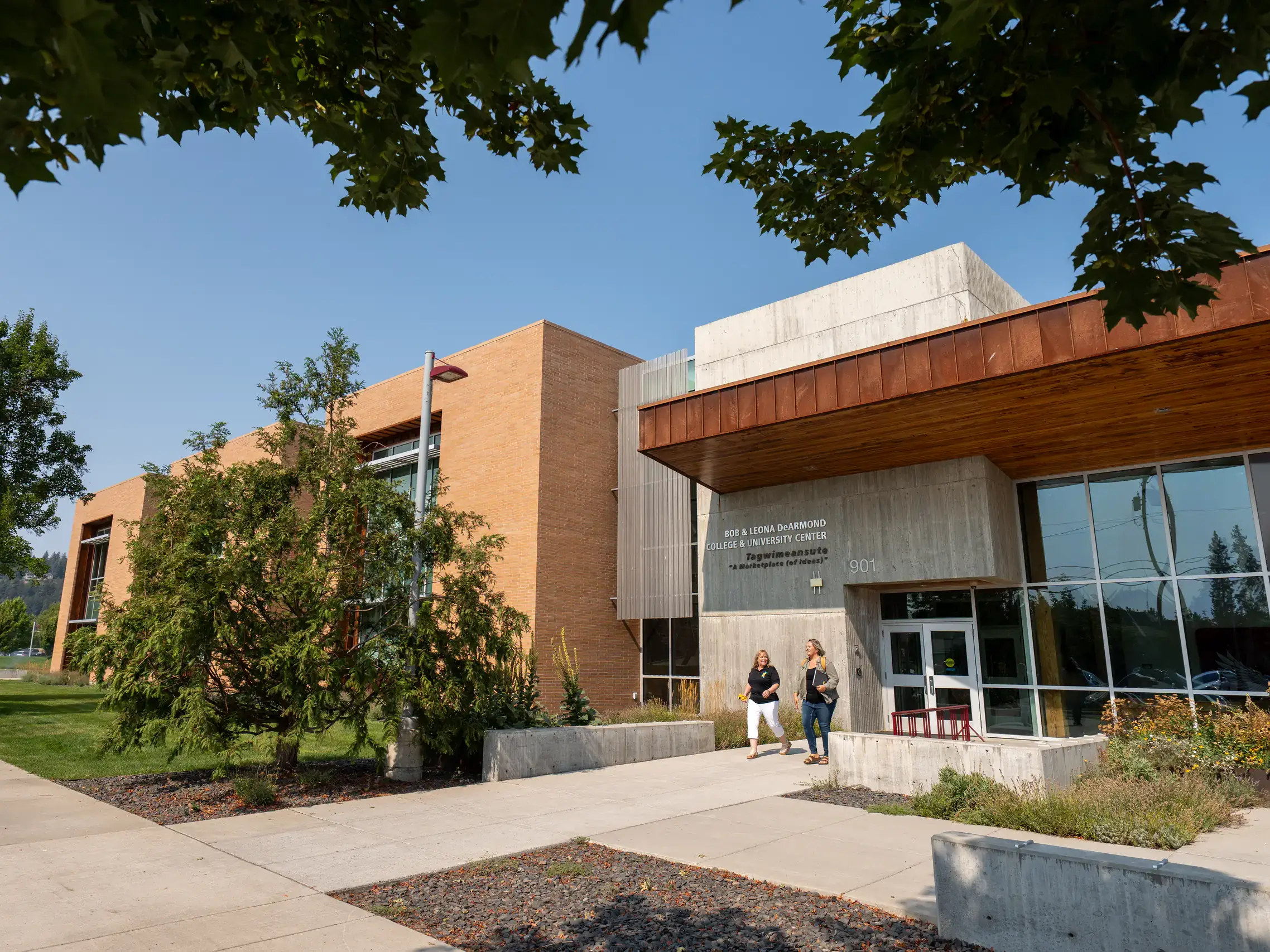 Rondah Curry (left) and Angie Presley (right), both students in the Child Development and Early Childhood Education B.S. programs, walk out of the DeArmond Building at the University of Idaho Coeur d'Alene campus on Wednesday, September 10, 2025.