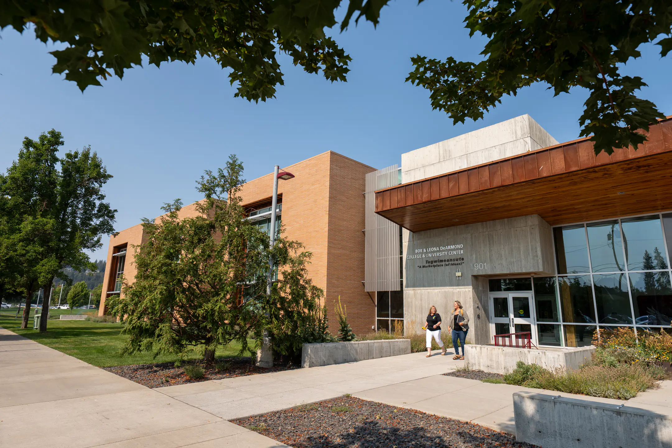 Rondah Curry (left) and Angie Presley (right), both students in the Child Development and Early Childhood Education B.S. programs, walk out of the DeArmond Building at the University of Idaho Coeur d'Alene campus on Wednesday, September 10, 2025.