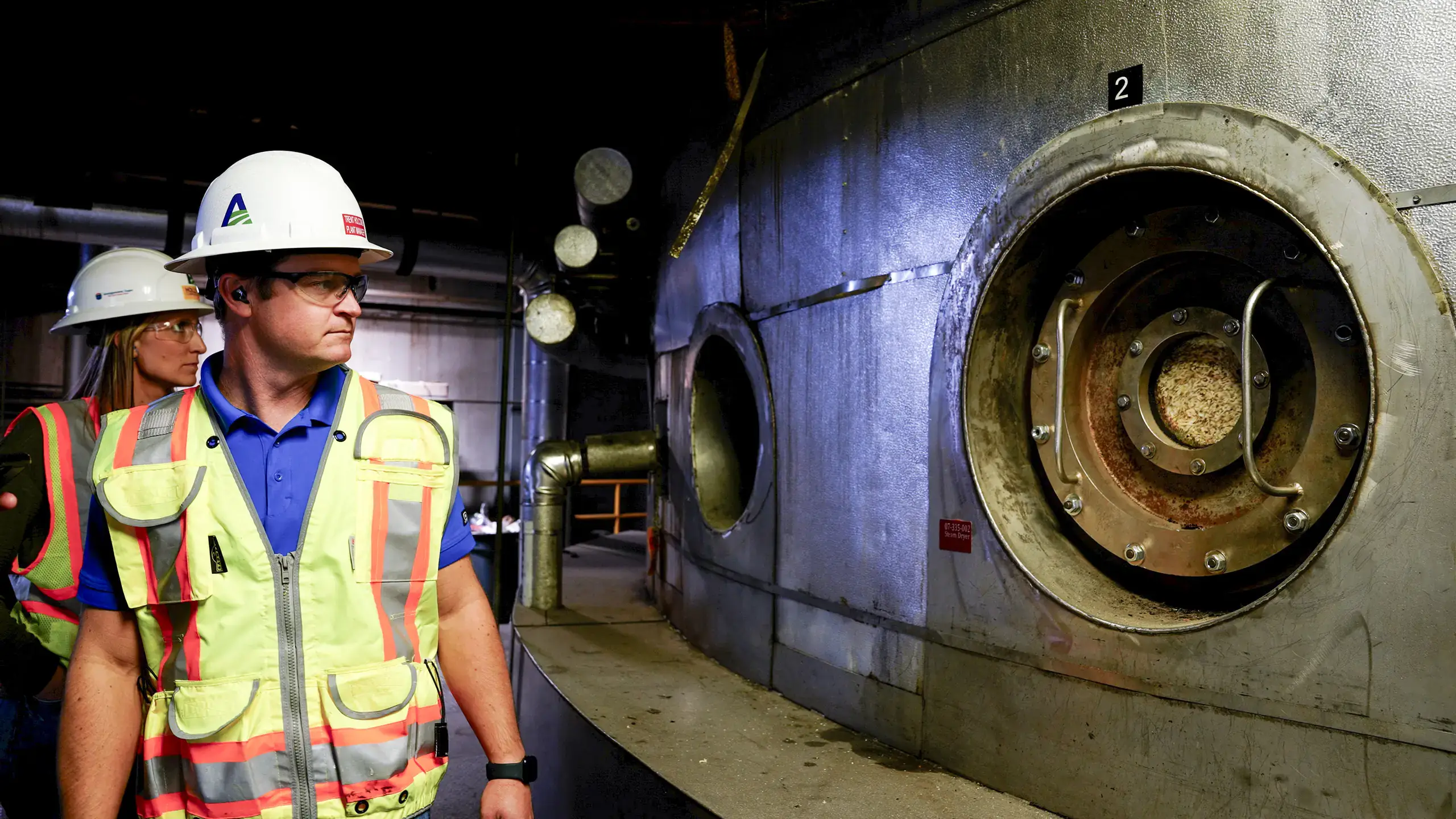 Trent Holcomb, plant manager, and Holly Luna, communications manager, are pictured at Amalgamated Sugar’s plant in Nampa, ID on Thursday, October 16, 2025. University of Idaho engineering students and faculty are developing AI-driven automation solutions for Amalgamated Sugar to keep the plant's assembly line from breaking down while adding components to maintain moisture levels in sugar beets, helping the company improve productivity and optimizing both quality and quantity. 