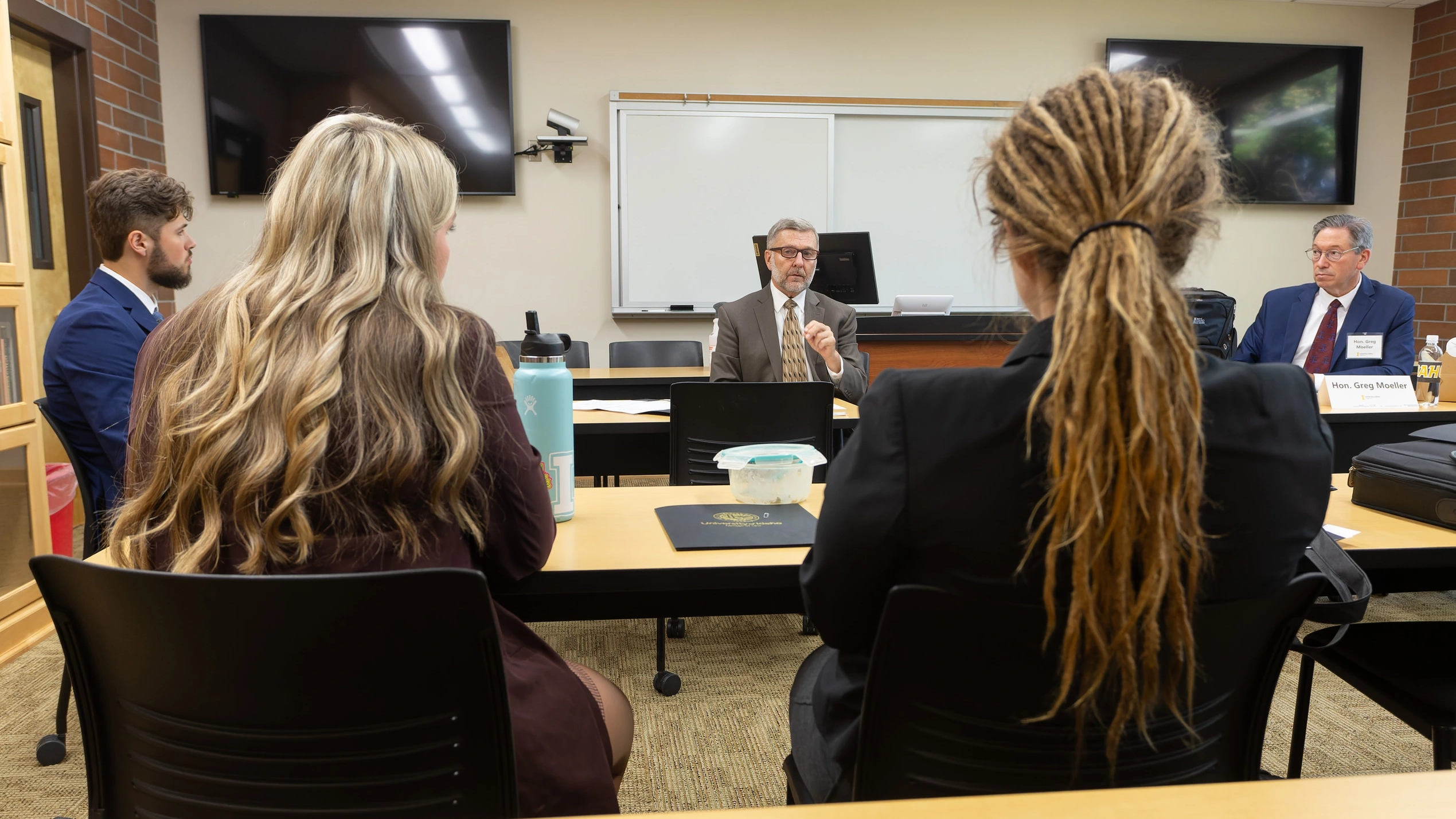 Students attending a small group session