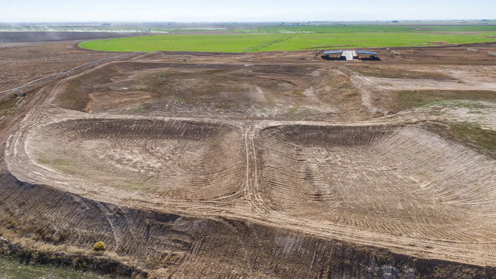 A bird’s-eye view of depressions excavated for holding dairy lagoon water.