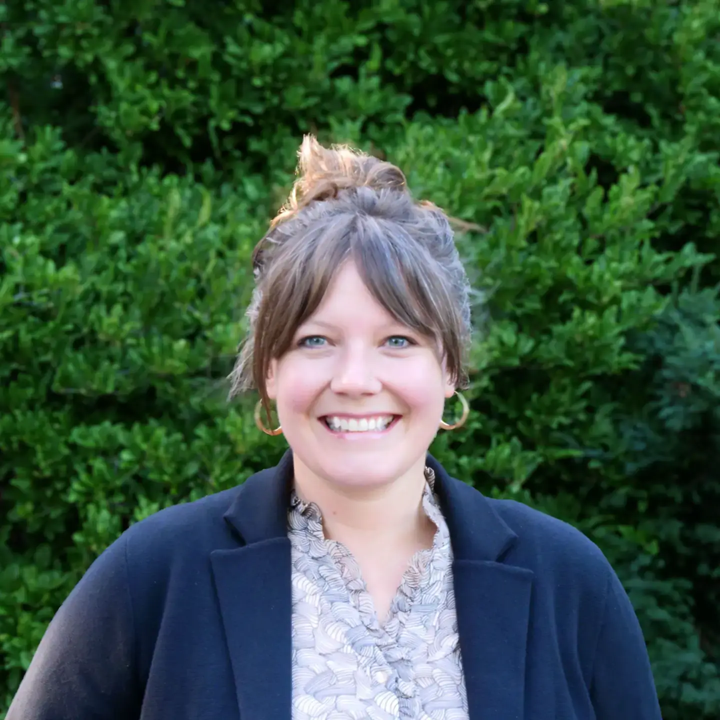 Portrait of Erin Corwine, Practicum Placement Coordinator, Instructor; Department of Curriculum and Instruction; College of Education, Health and Human Sciences.