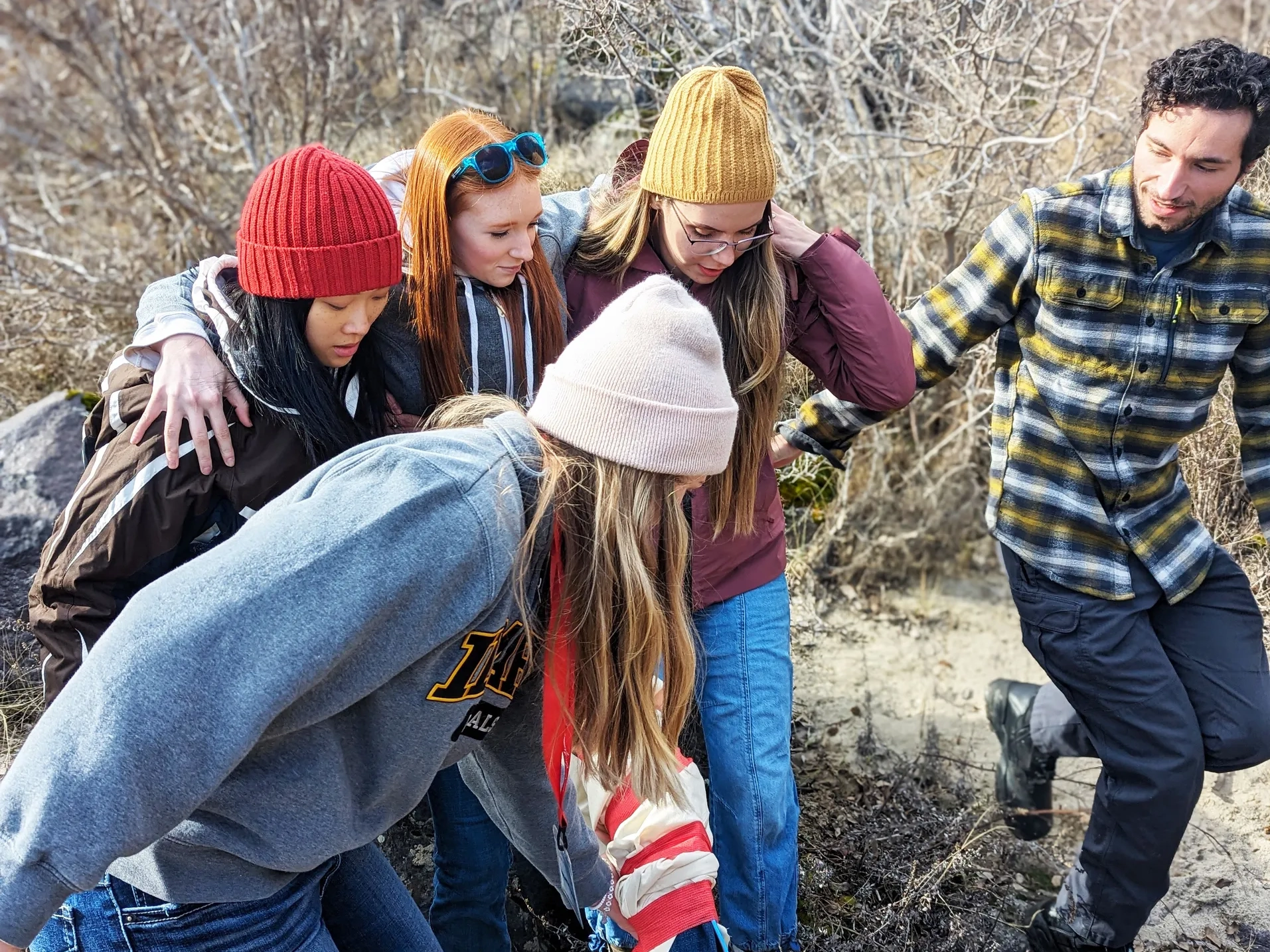 Idaho WWAMI students help a volunteer victim during a medical simulation