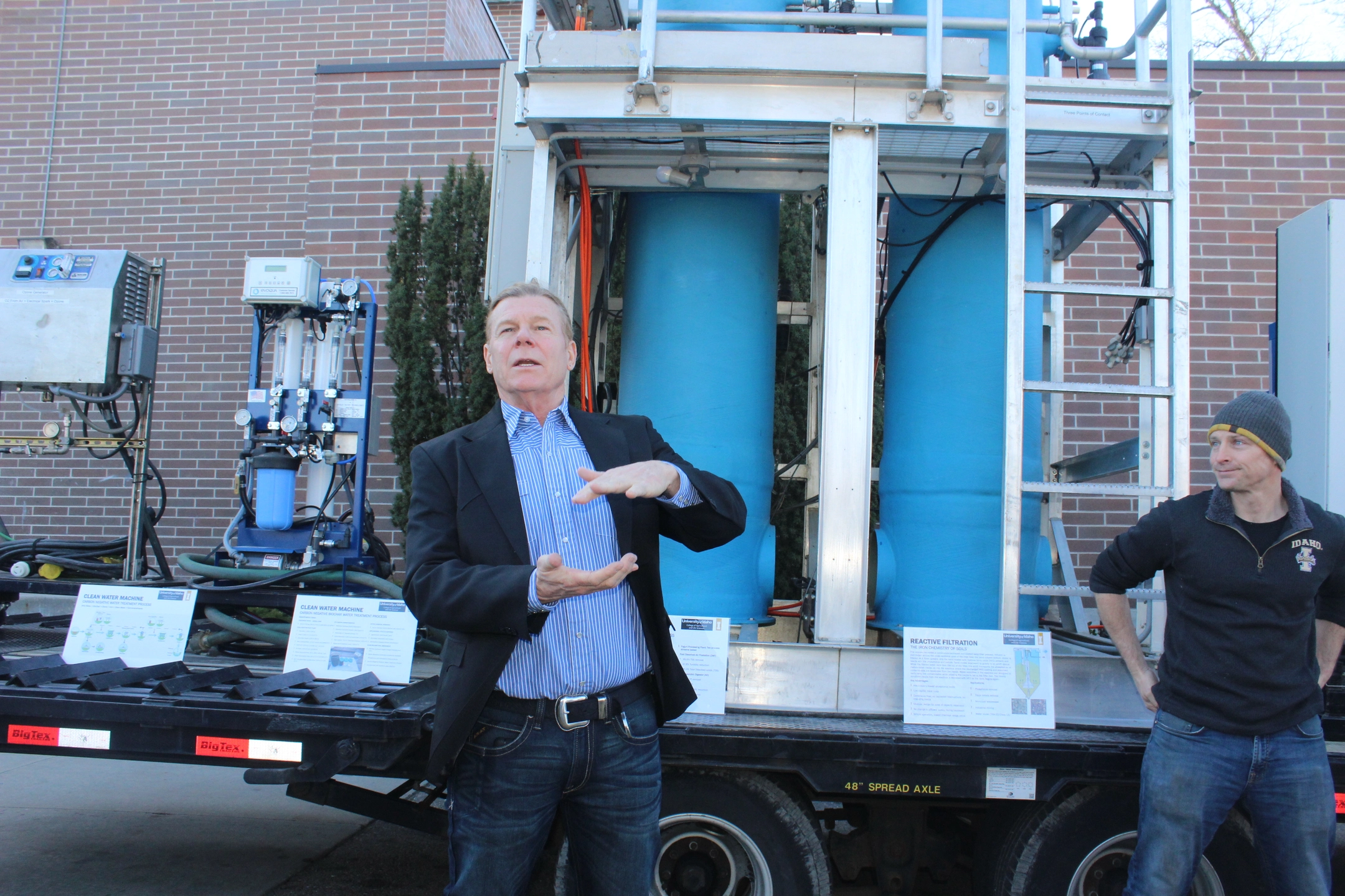 Greg Moller stands in from of the large Clean Water Machine.    