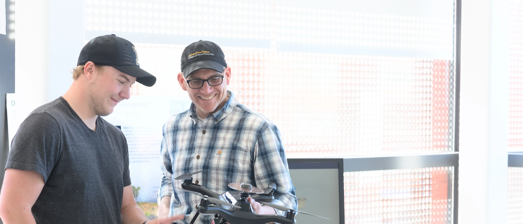 Student Dan Lauritzen working in the drone lab with Jason Karl for the College of Natural Resources