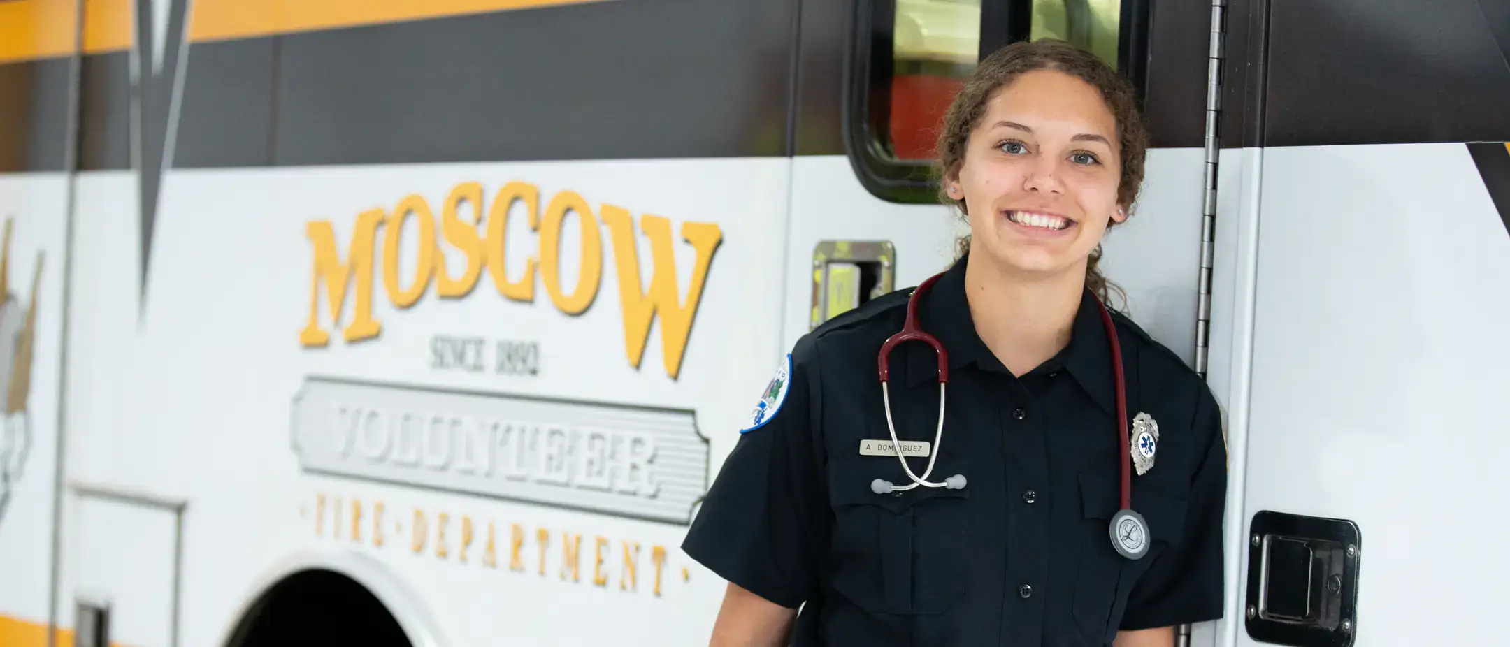Portrait of Medical Sciences B.S. student Angel Dominguez in the ambulance cab while working with the Moscow Volunteer Fire Department as a EMT student volunteer.