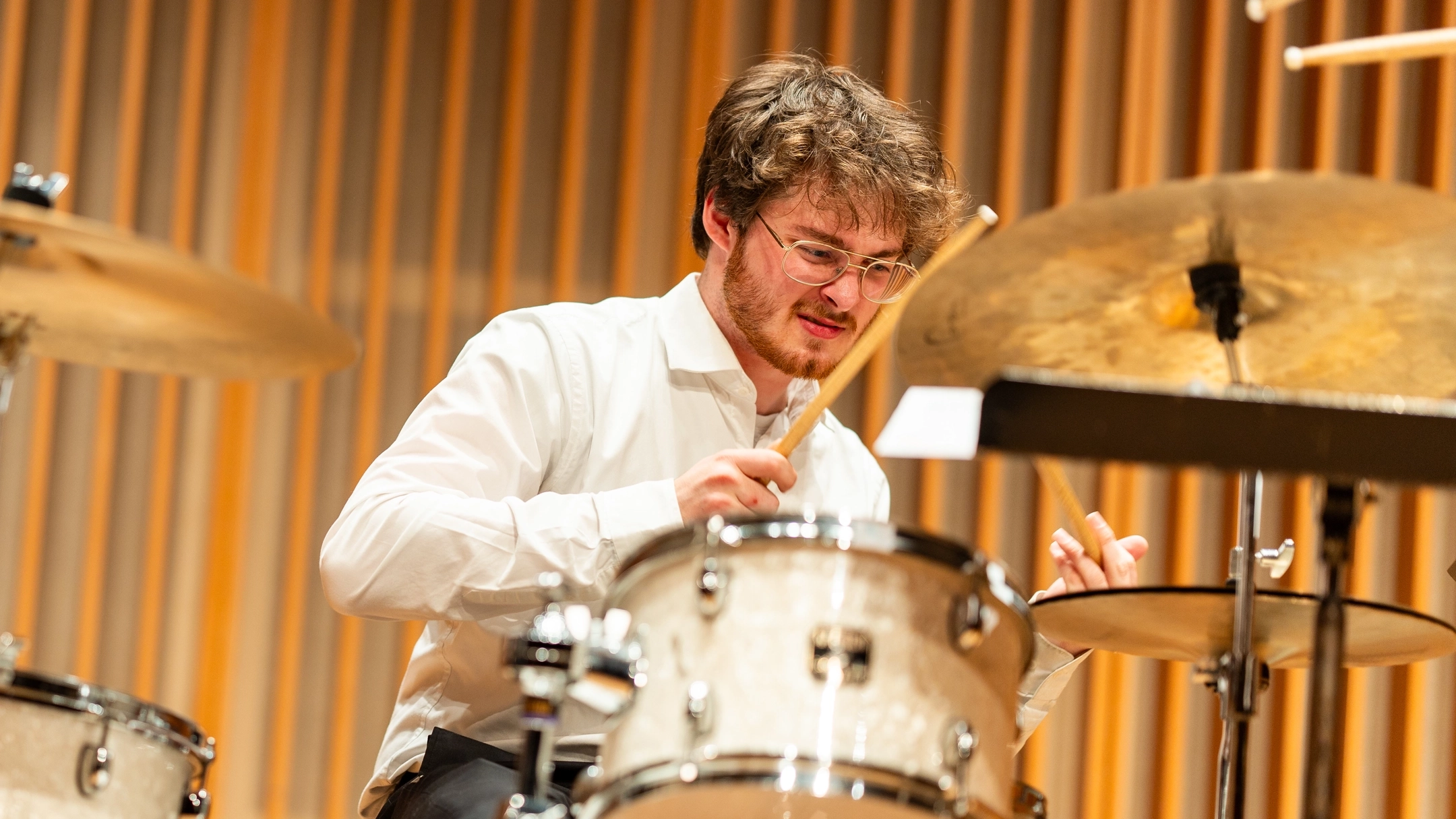 Graduation story and Jazz Festival story on senior music student Mason Oyler.