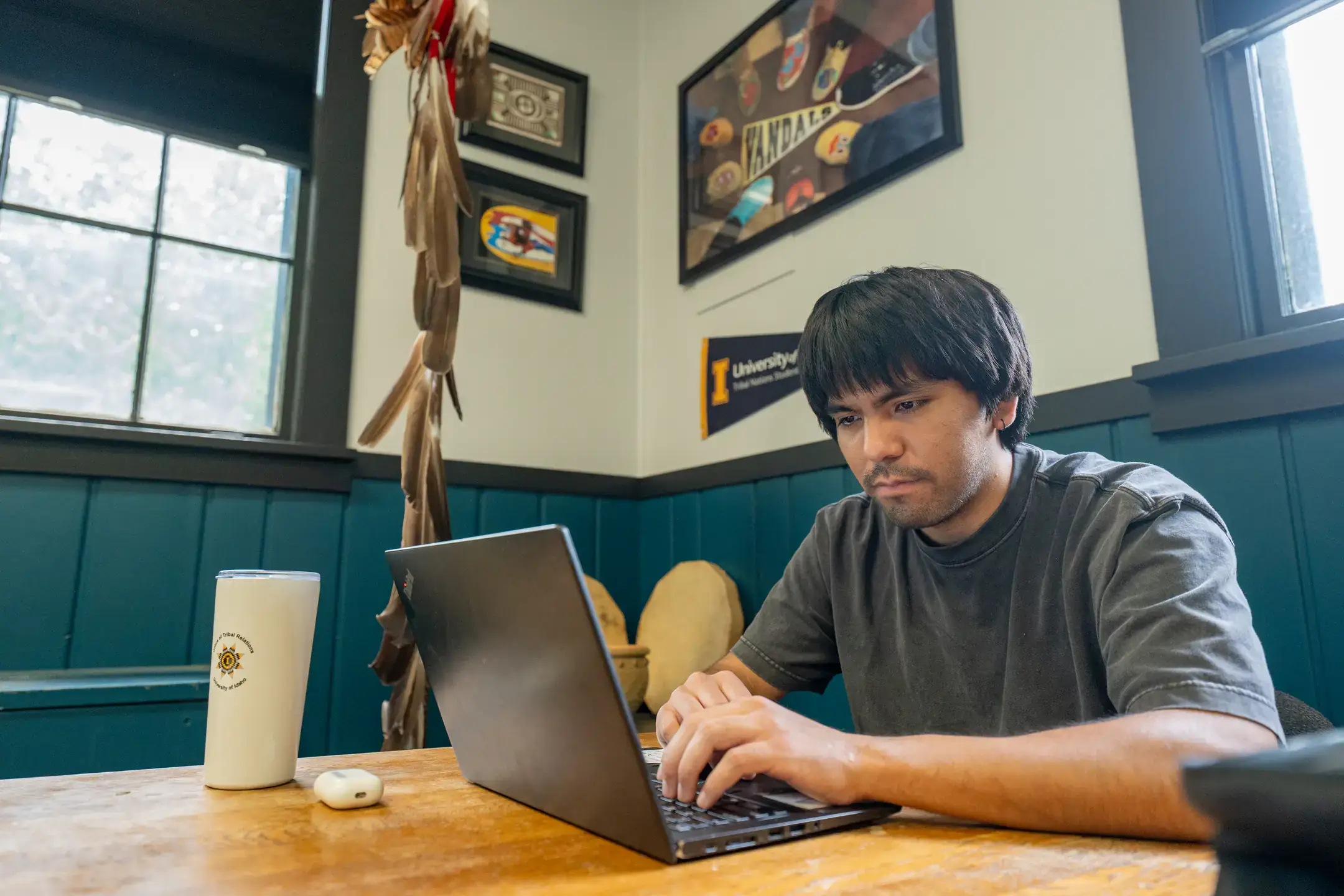 Jonas Oatman, a Nez Perce student who came to U&nbsp;of&nbsp;I through Tribal Nations Student Affairs’ Indigenous Nation Scholars Training for Excellence Program (INSTEP), is pictured at the Native American Student Center on Thursday, June 25, 2026. After graduating in Spring ’26 with a BS in Computer Science and a BS in Mathematics, Oatman will be continuing at the U&nbsp;of&nbsp;I for a master's in computer science.