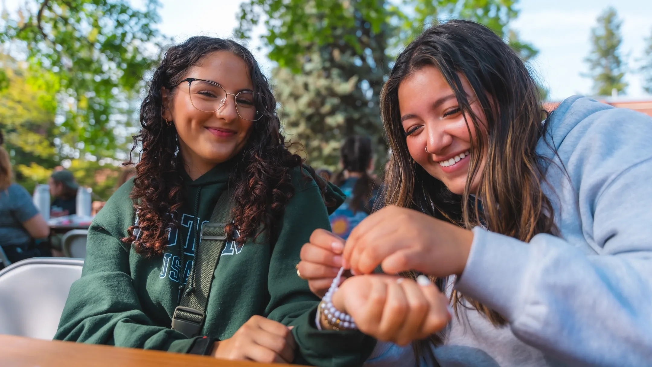 Snapshots from Start Up Orientation week, featuring FSL events, friendship bracelet making, Palousafest, Vandal Scramble, Screen on the Green, Move-In, Family Send-Off, and the Multicultural BBQ.
