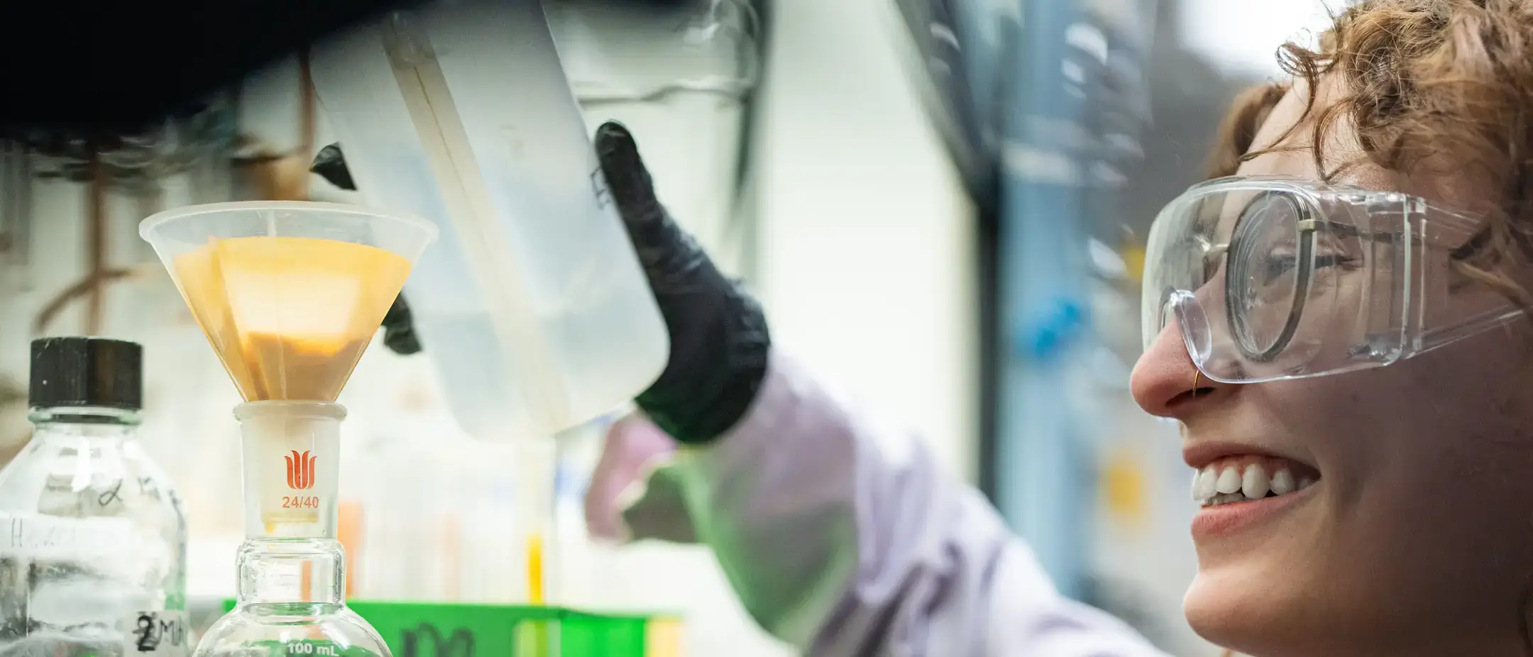 Maddie Moody works in a fume hood separating elements in Dr. Wandruszka's Lab in Renfrew Hall on the University of Idaho campus.