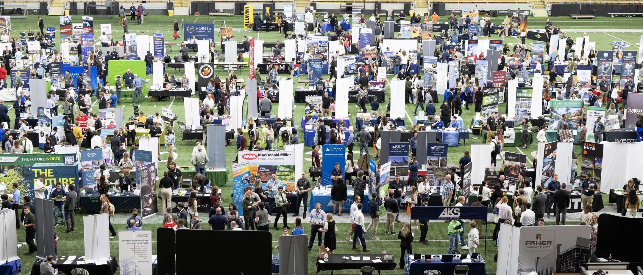 An elevated view of all the employer booths at the Career Fair in the Kibbie Dome.