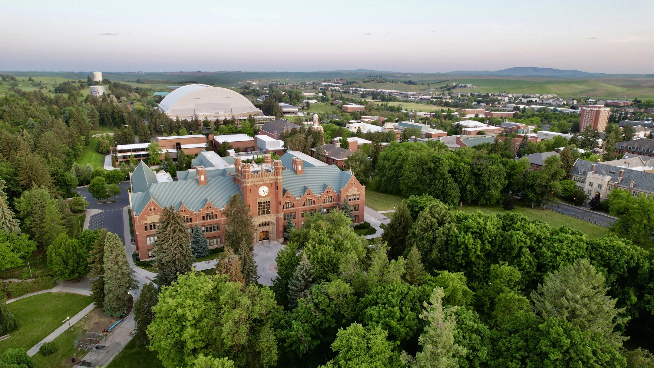 An aerial view of U of I Moscow campus, with the Administration Building, P1FCU Kibbie Dome and other buildings in view.