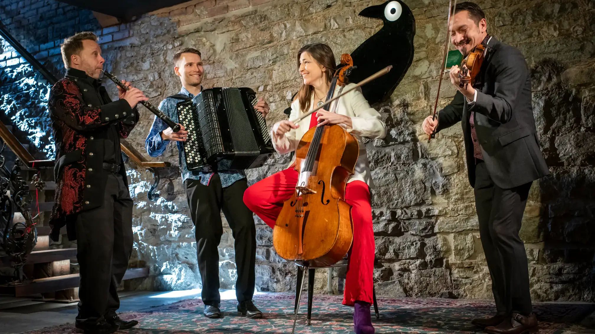 The four members of Quartetto Gelato playing their instruments.