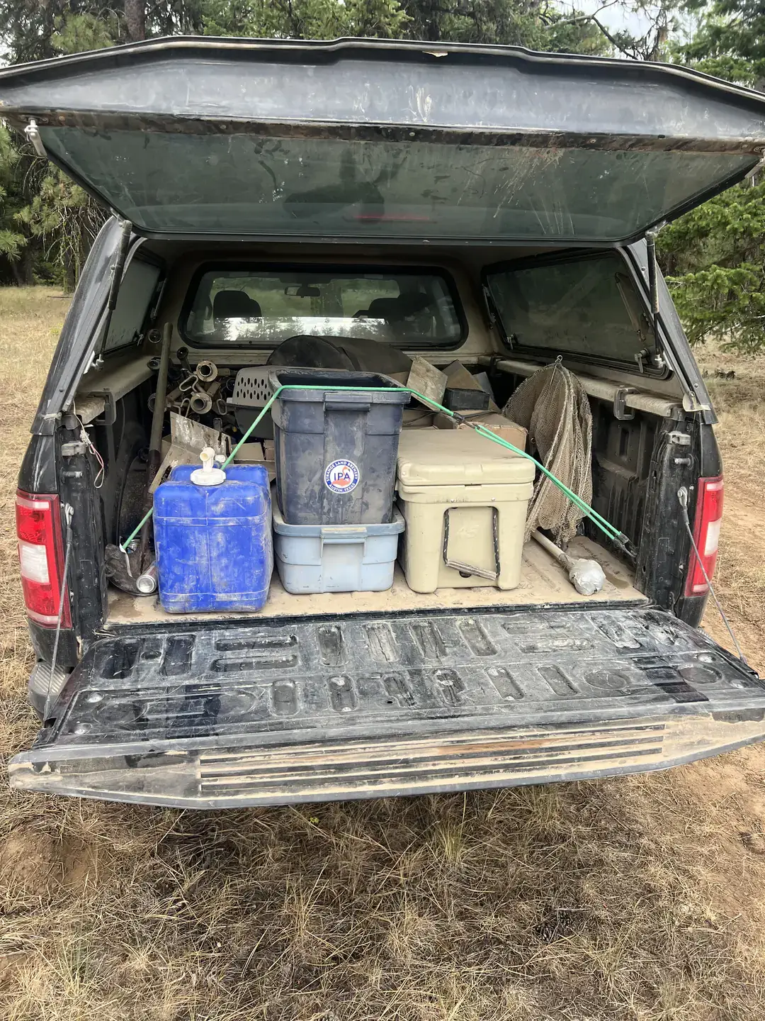 the back of a pickup truck loaded with research gear