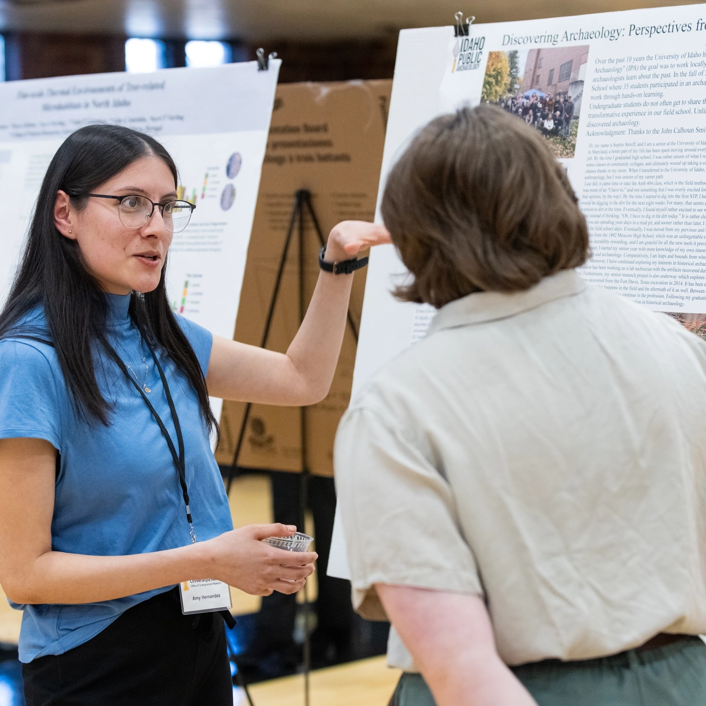Students presenting about their research at the Office of Undergraduate Research Symposium.