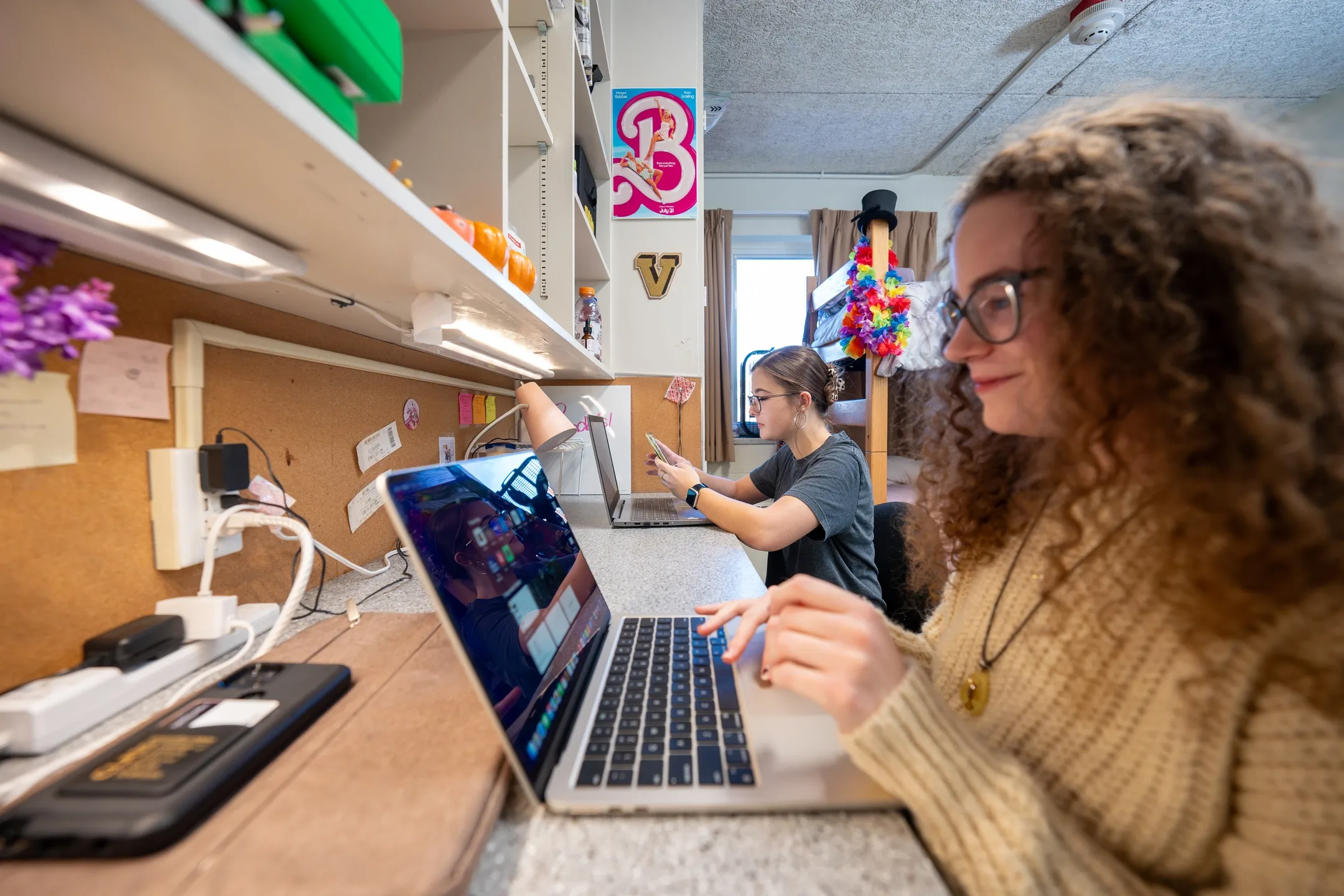 Housing and Residence Life dorm rooms with students.