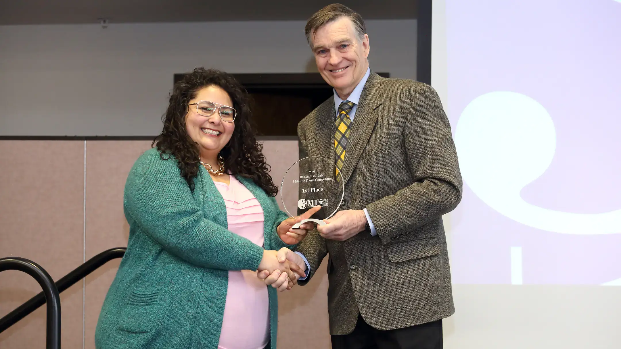The Three Minute Thesis (3MT) 2025 Statewide Graduate Student Competition is held in the Bennion Student Union Building at the University of Idaho - Idaho Falls campus on Tuesday, February 11, 2025.

Graduate students from University of Idaho, Boise State University and Idaho State University compete annually in the 3MT statewide competition and present their research in just three minutes or less with only one slide. A panel of judges choose 1st, 2nd, and 3rd place, and the audience gets the chance to vote for the People's Choice Award.

Rita Franco is awarded 2nd Place and the People’s Choice Award for her thesis “Improving Child Nutrition Through Household Poultry Projects in Guatemala”.