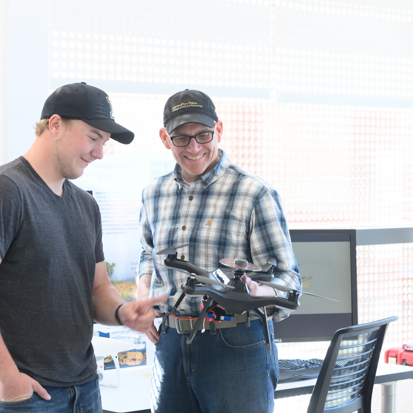 Student Dan Lauritzen working in the drone lab with Jason Karl for the College of Natural Resources