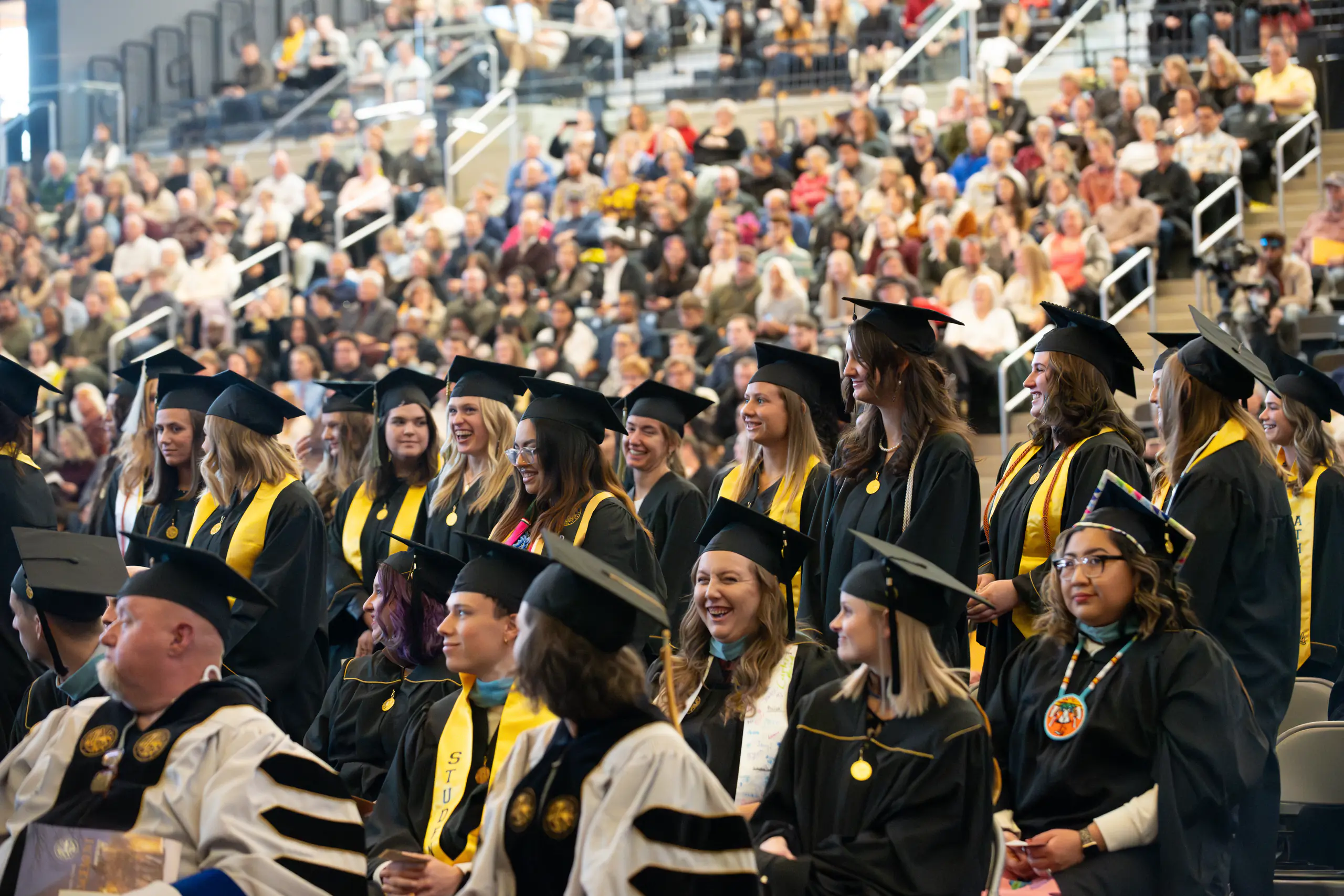 A group of students in their cap and gown during graduation