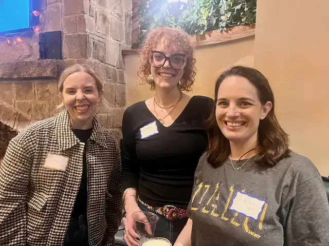 Three U of I distance M.F.A. students are pictured together at a meet up in New York City.
