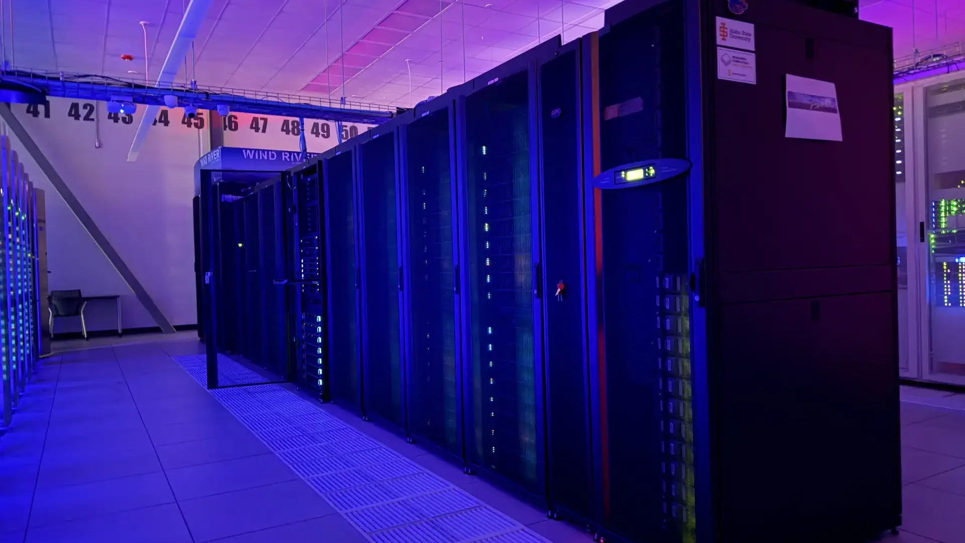 Rows of high-performance computing servers inside a data center.