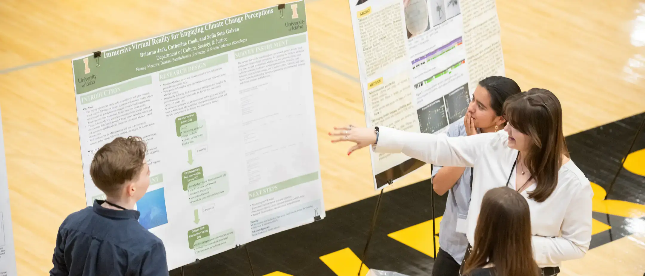 Students presenting about their research at the Office of Undergraduate Research Symposium.