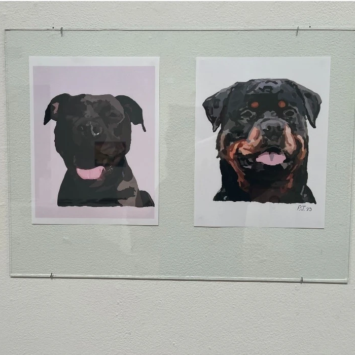 a black dog and rottweiler abstractly painted 