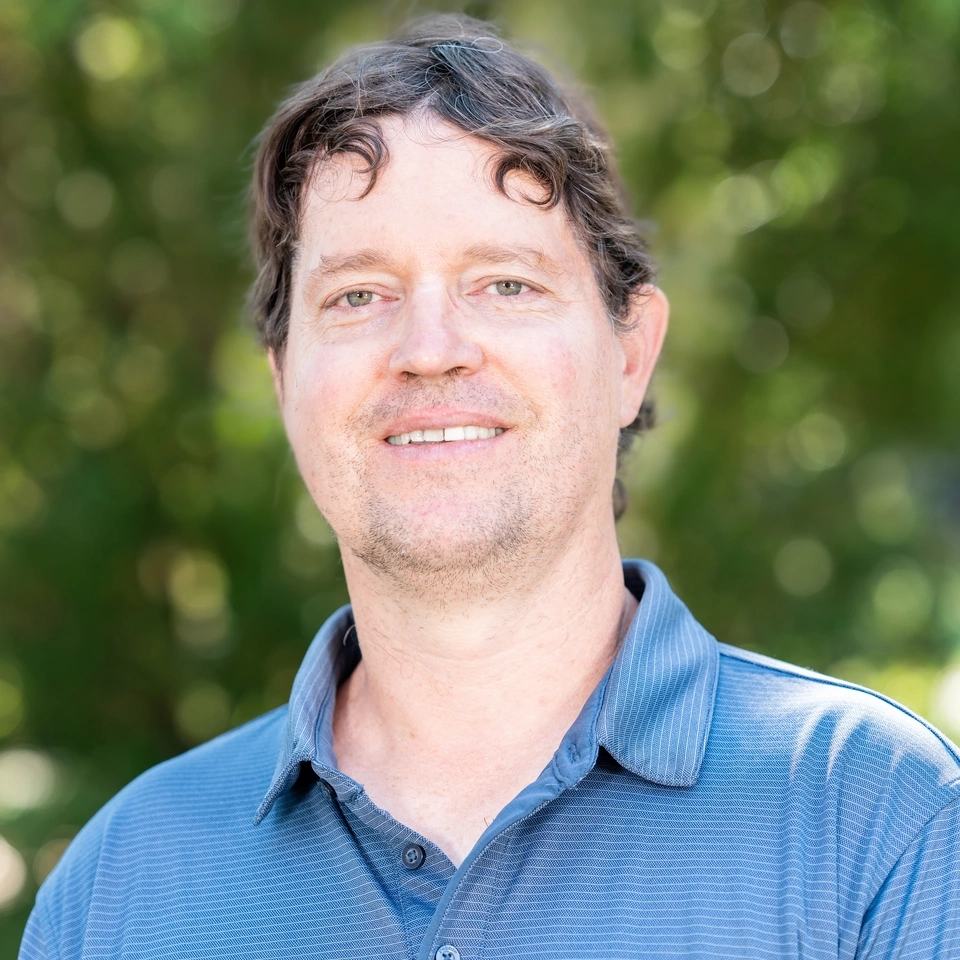 Portrait of Assistant Director of Communications in the College of Agricultural and Life Sciences, John O'Connell.
