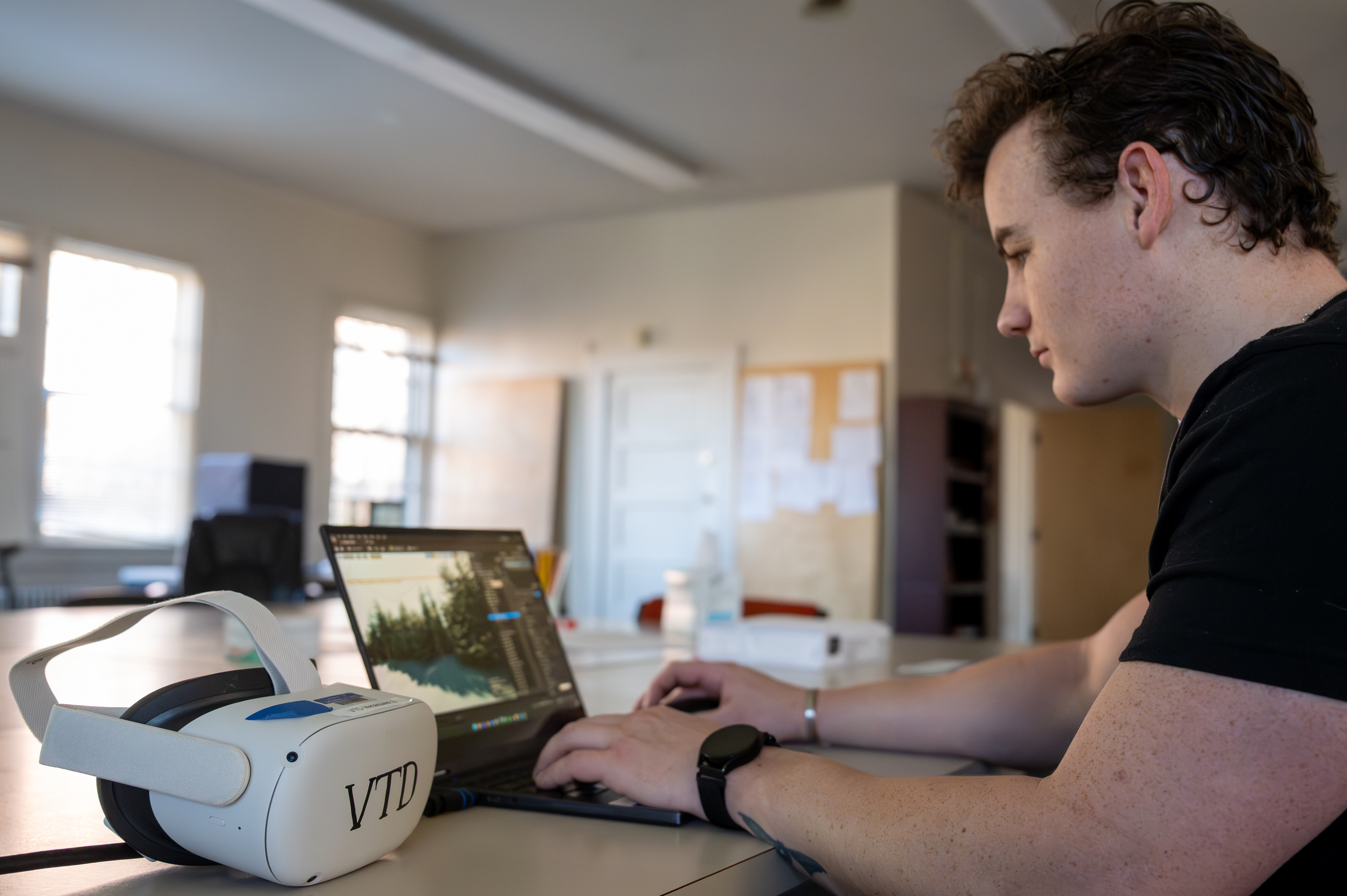 Porter Howard, a senior majoring in Virtual Technology and Design, is pictured Thursday, February 5, 2026. College of Art and Architecture students have built virtual worlds for Micron and U.S. Forest Service projects.