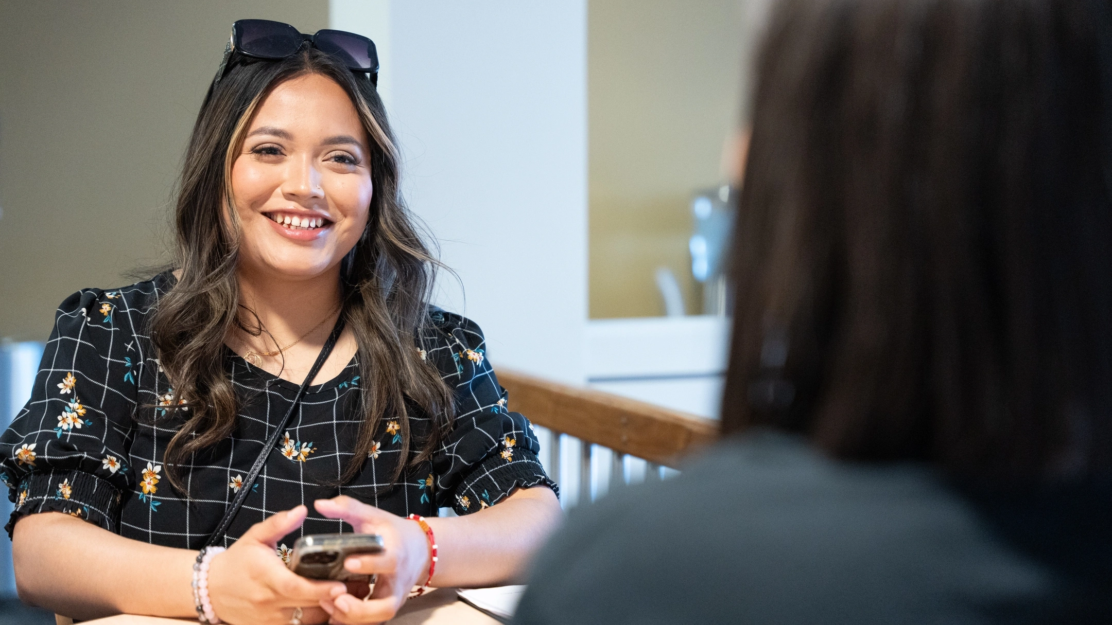 Student recieves advising from College Assistance Migrant Program (CAMP)  Advising Specialist, Alondra Ibarra, at the UIdaho Bound event on the University of Idaho campus, June 14th, 2024