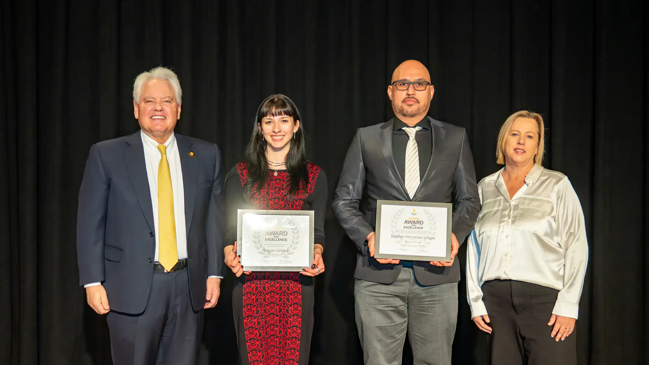 Alumni Awards for Excellence Dinner on Tuesday, November 8, 2025 in the International Ballroom at the Pitman Center. Pictured from left are: UI president Scott Green; student Reagan Johnson; Esteban Hernandez-Vargas, associate professor of mathematics; Sandy Larsen, director of alumni engagement.