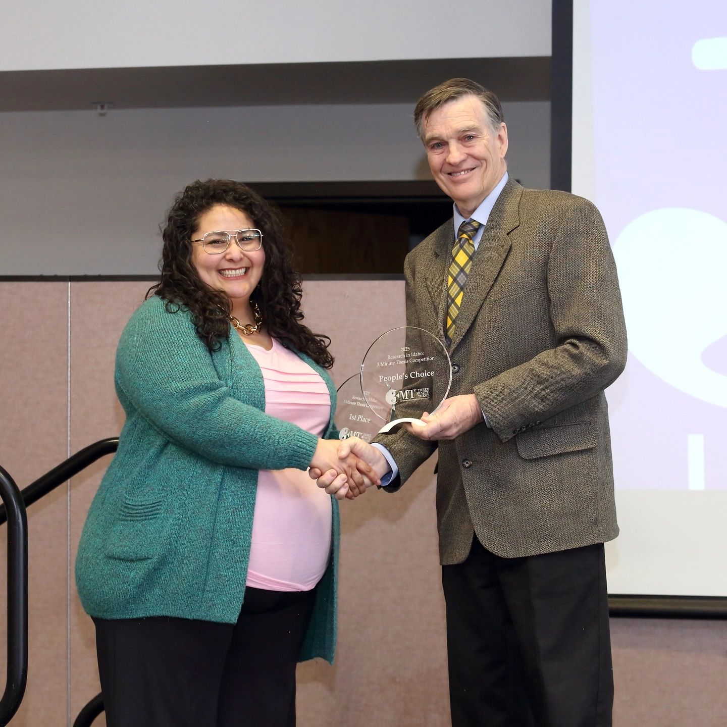 The Three Minute Thesis (3MT) 2025 Statewide Graduate Student Competition is held in the Bennion Student Union Building at the University of Idaho - Idaho Falls campus on Tuesday, February 11, 2025.

Graduate students from University of Idaho, Boise State University and Idaho State University compete annually in the 3MT statewide competition and present their research in just three minutes or less with only one slide. A panel of judges choose 1st, 2nd, and 3rd place, and the audience gets the chance to vote for the People's Choice Award.

Rita Franco is awarded 2nd Place and the People’s Choice Award for her thesis “Improving Child Nutrition Through Household Poultry Projects in Guatemala”.