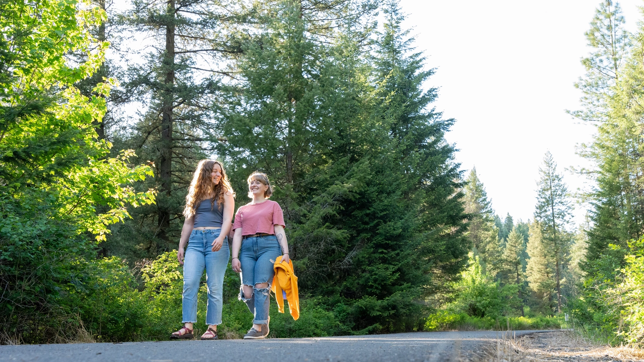 Students walk on the Bear Creek canyon portion of the Latah Trail.