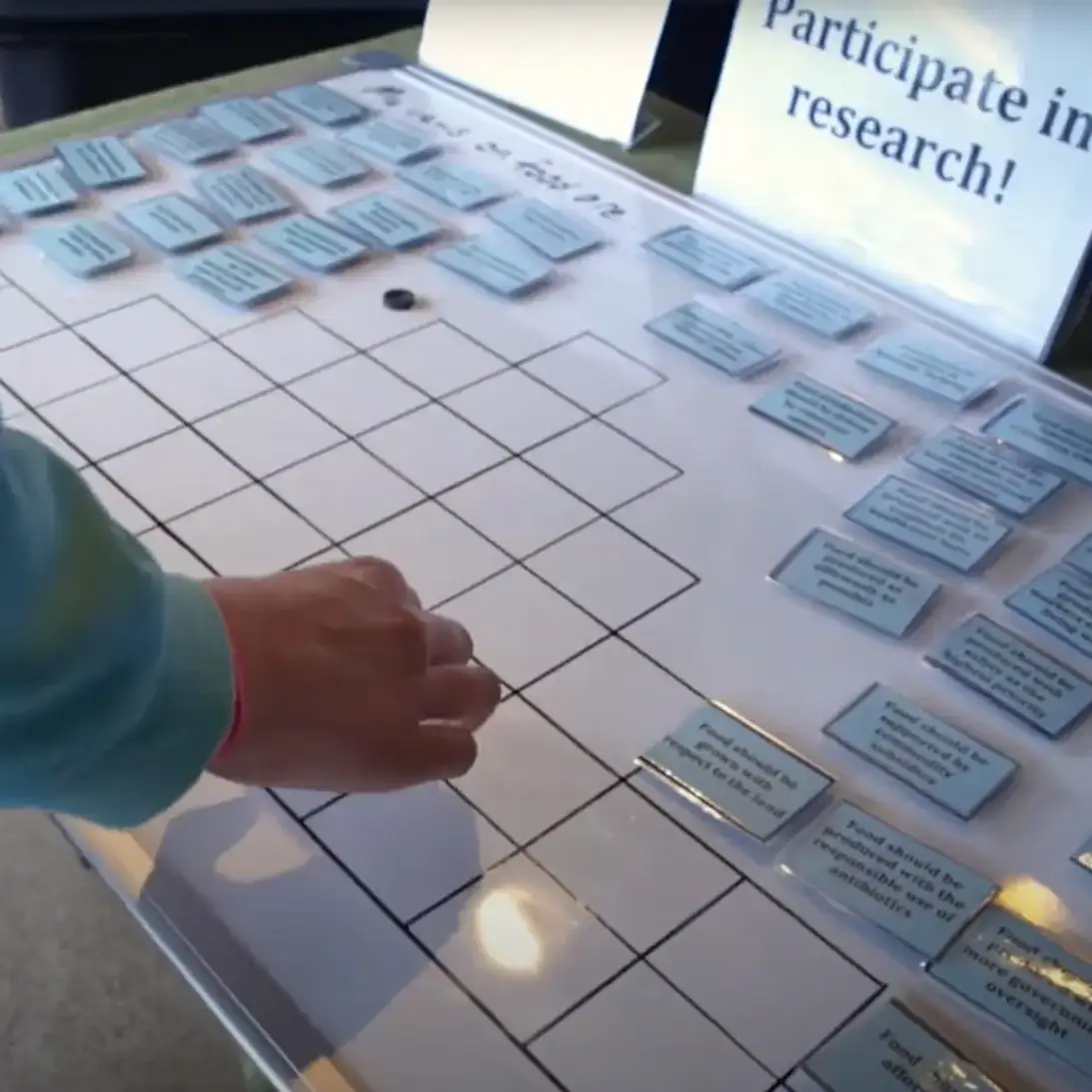 Consumer participating in research at a grocery store