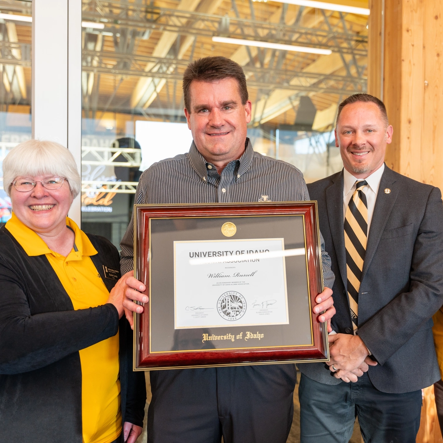 University Advancement Alumni Relations and William "Bill" Russell at the Latah County Silver &amp; Gold awards in the Idaho Central Credit Union Arena Alumni Lounge.