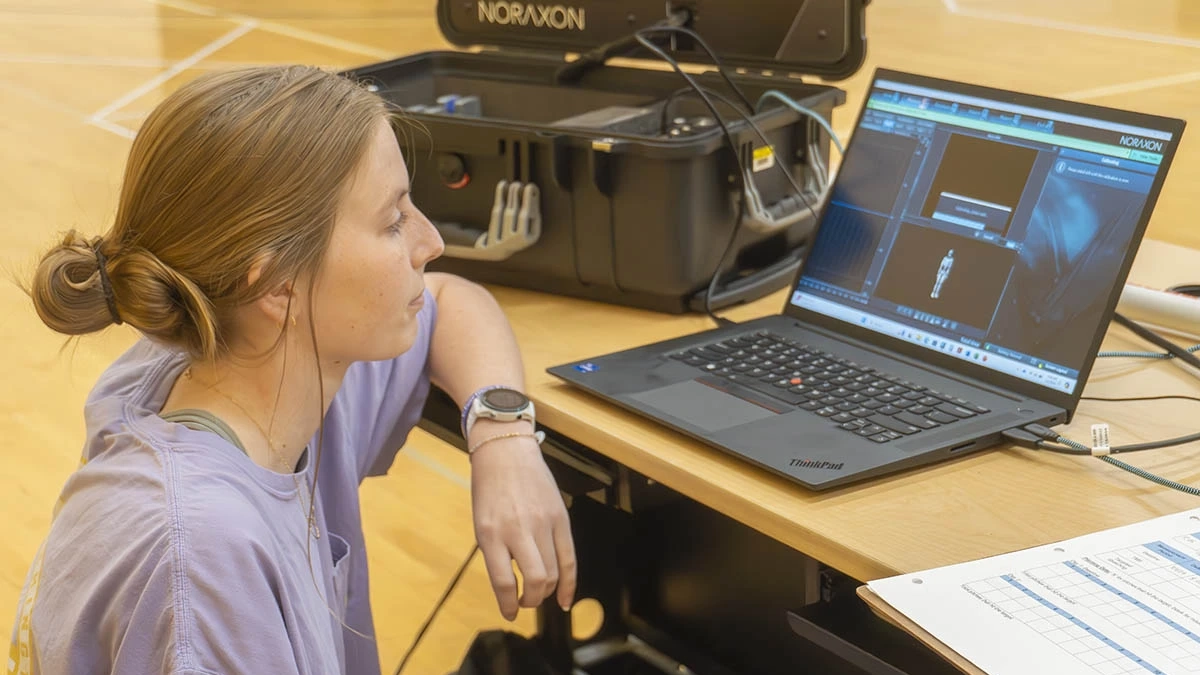 Student looking at computer screen.