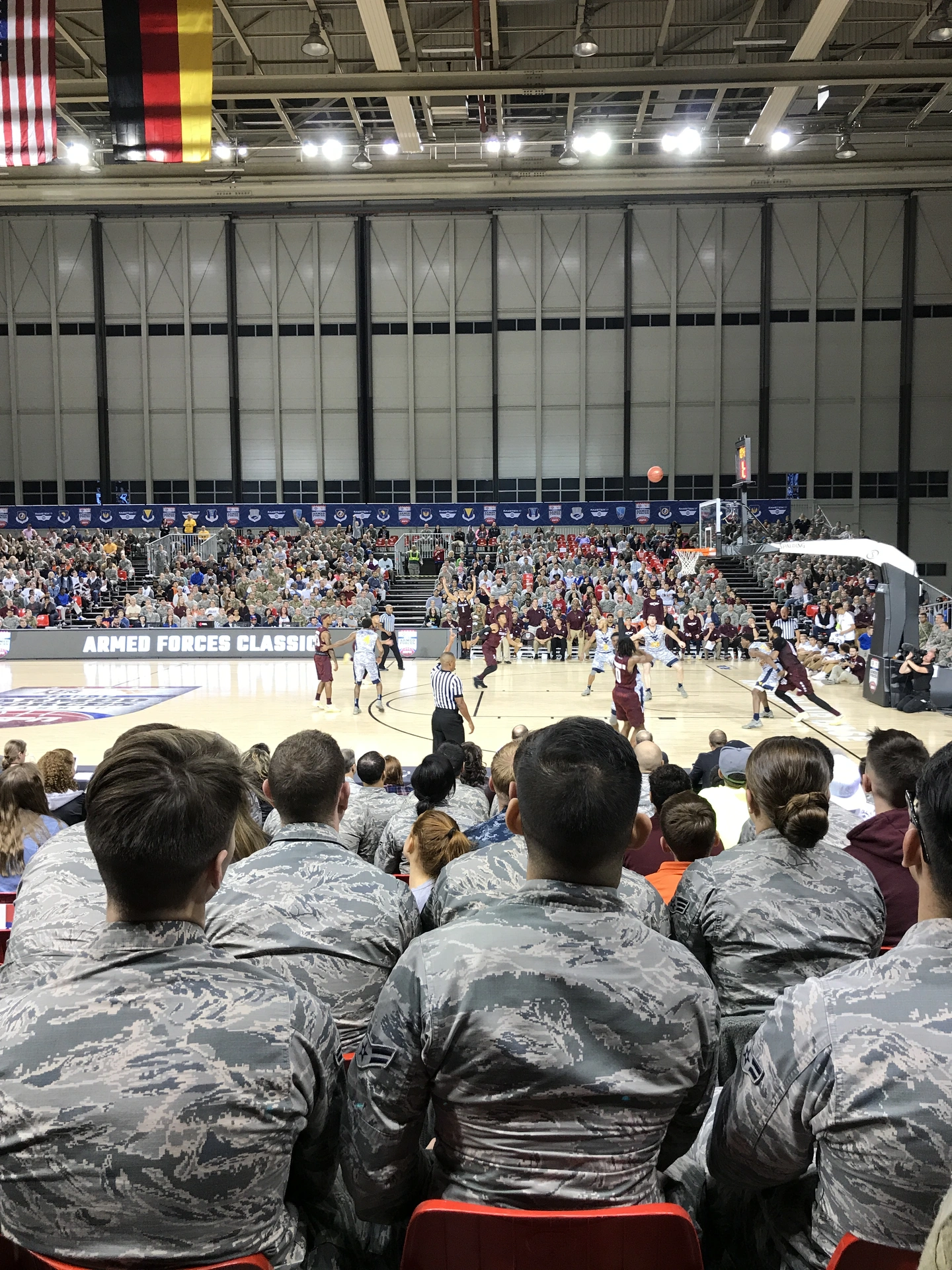 Servicemen and women watch the Armed Forces Classic college basketball game at Ramstein Air Force Base in 2017.