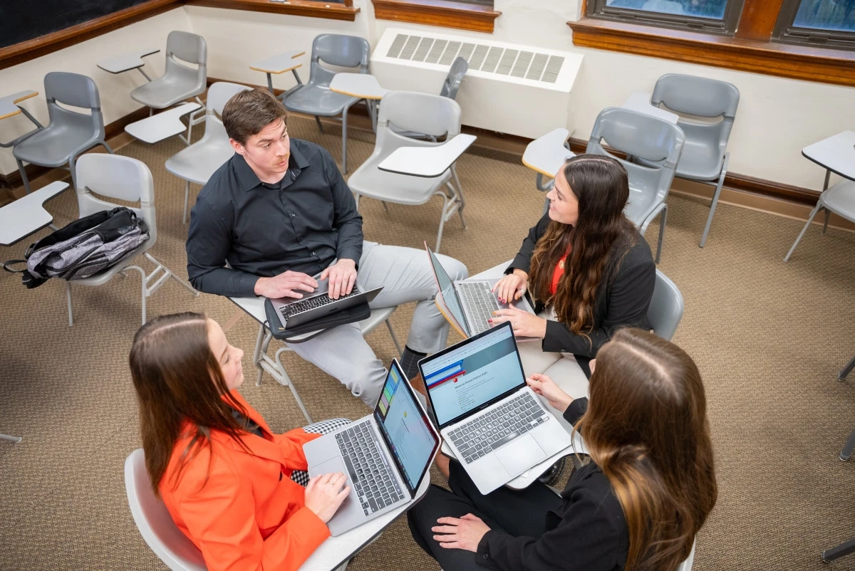 Students in the Administration building working on a Moscow School District ad campaign presentation for their Public Relations course.