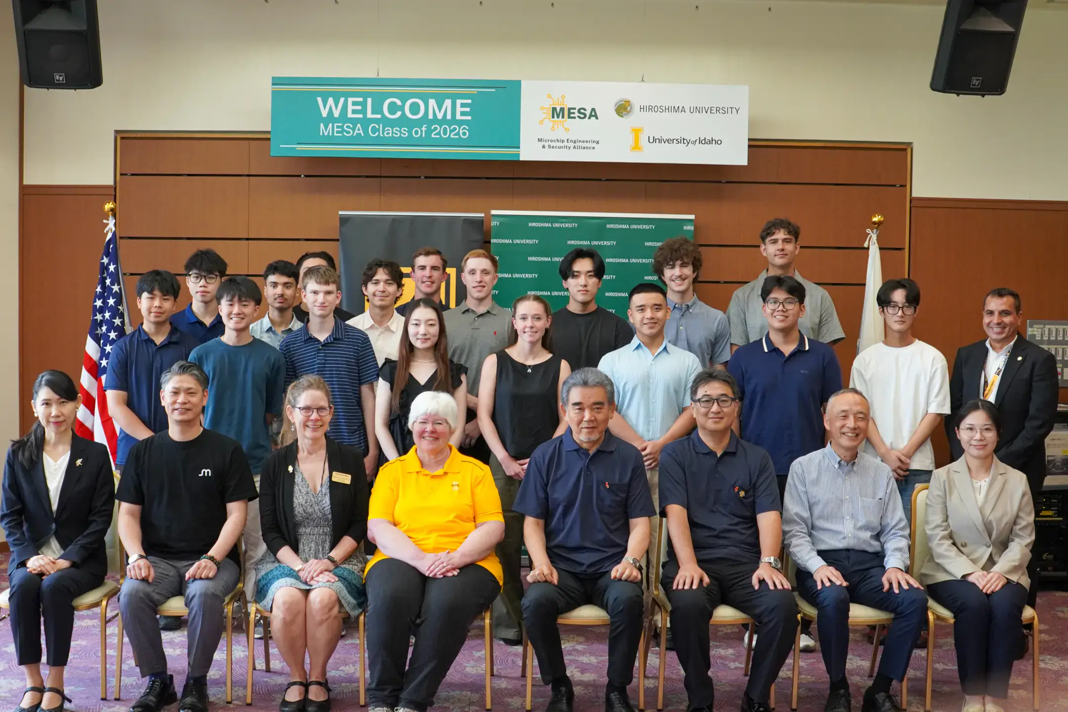 A group photo of individuals posing in front of a banner that reads "Welcome MESA Class of 2026".