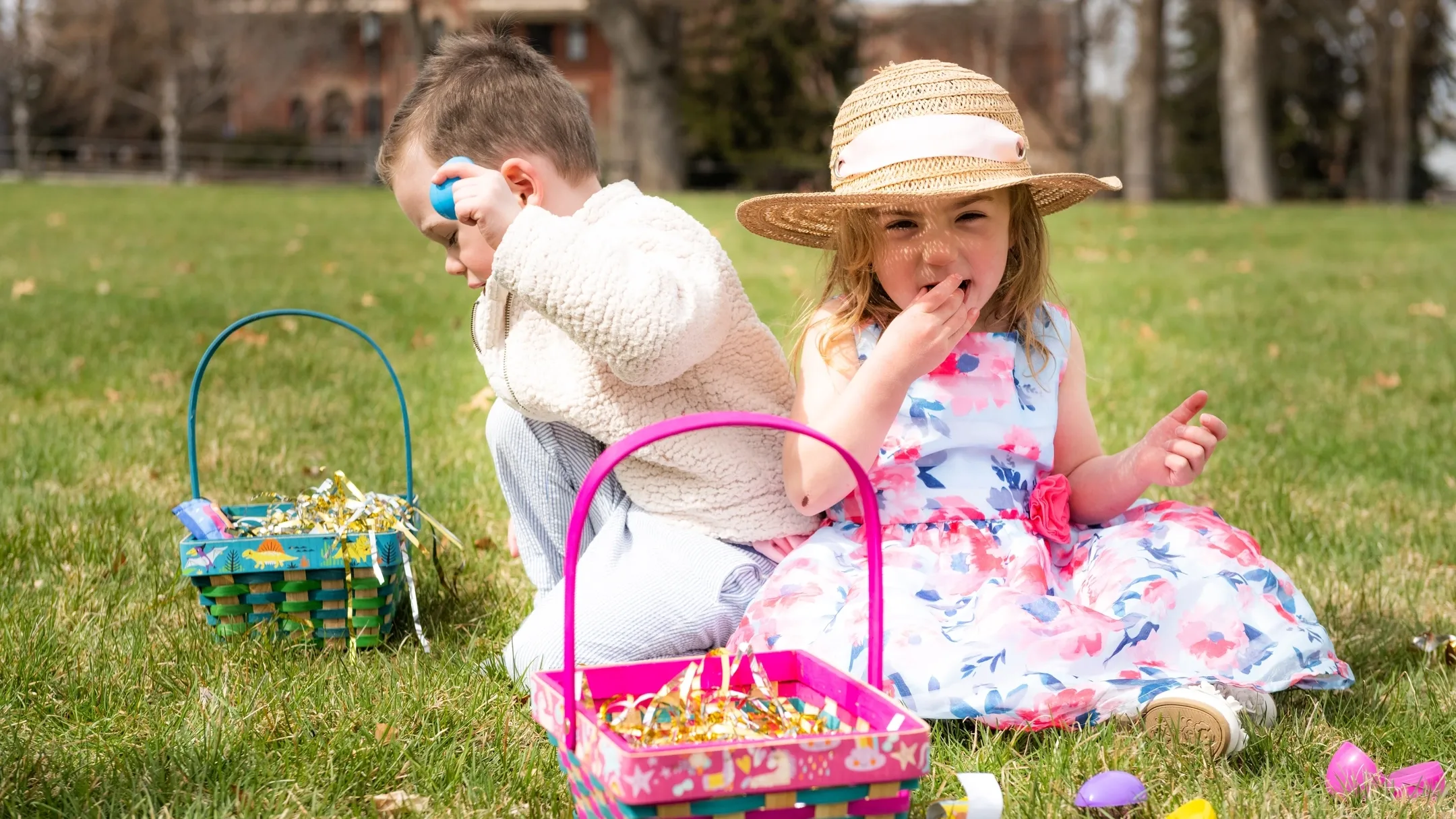 Children search for easter eggs on the Admin Lawn.