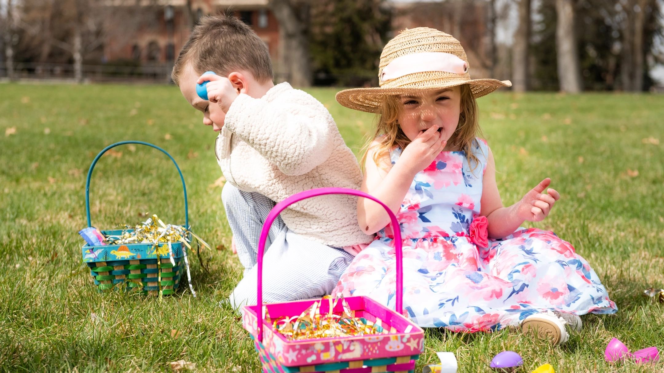 Children search for easter eggs on the Admin Lawn.